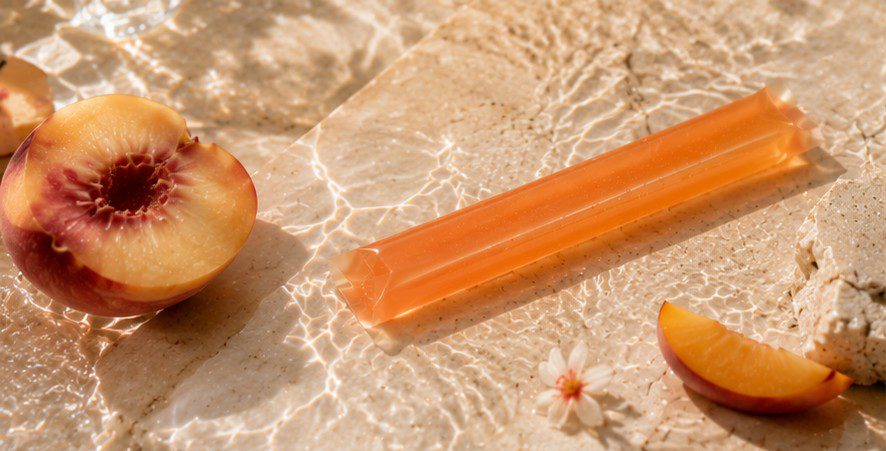 Peach and apricot jelly stick with fresh fruit