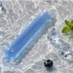 Recover jelly stick leaning on travertine blocks with grapefruit and mint